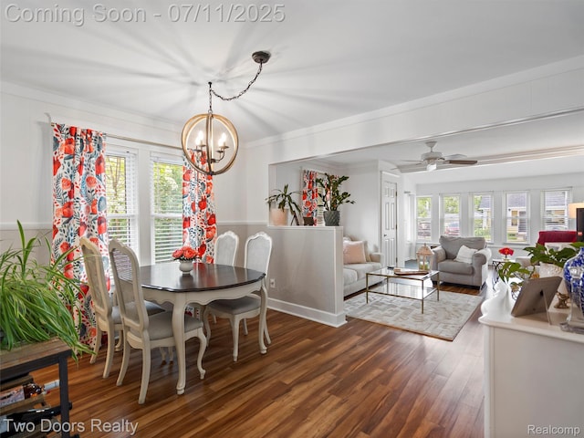 30 Beebe St, Lake Orion, MI 48362 - dining room featuring wood finished floors, healthy amount of natural light, a chandelier, ceiling fan, and crown molding