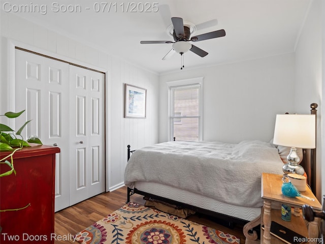 30 Beebe St, Lake Orion, MI 48362 - bedroom with ornamental molding, wood finished floors, a closet, and ceiling fan
