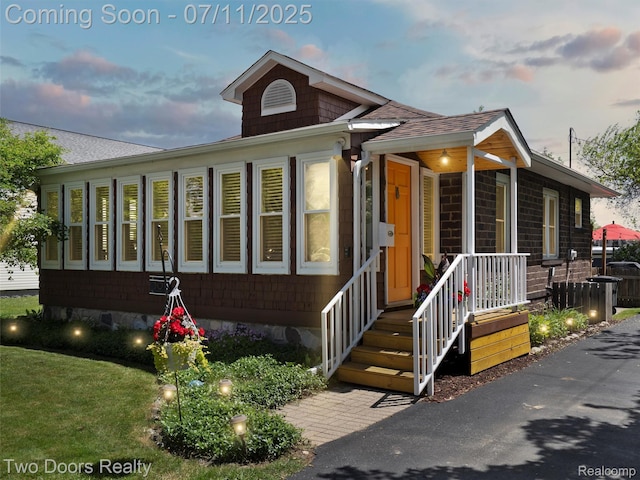 30 Beebe St, Lake Orion, MI 48362 - view of front of home with roof with shingles