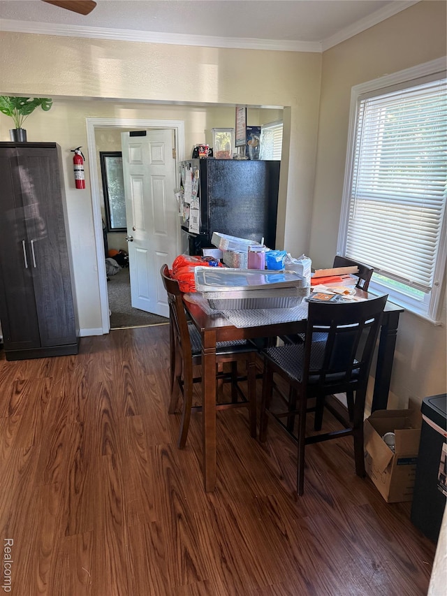 19361 Lindsay St, Detroit, MI 48235 - dining space featuring dark wood finished floors and ornamental molding