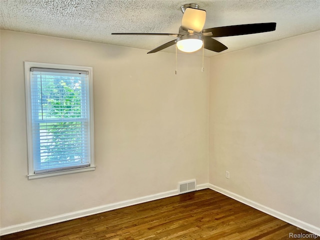 1992 Griffith Ave, Berkley, MI 48072 - empty room with wood finished floors, ceiling fan, and a textured ceiling