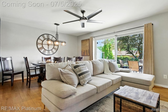11634 Spicer Dr, Plymouth, MI 48170 - living area featuring ceiling fan and wood finished floors