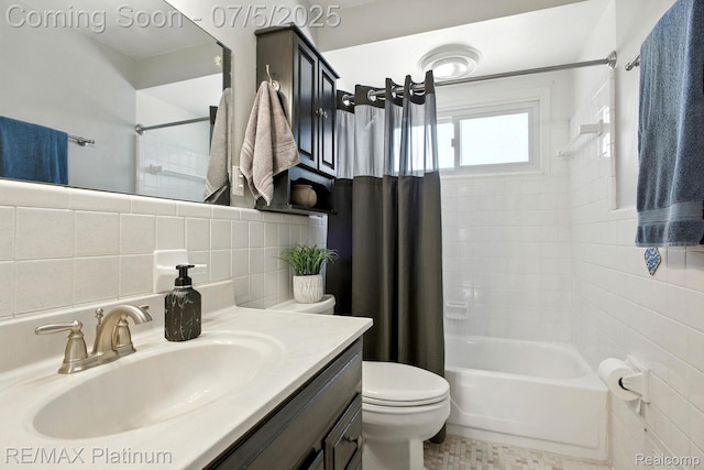 11634 Spicer Dr, Plymouth, MI 48170 - full bathroom with tile walls, shower / bath combo with shower curtain, vanity, and decorative backsplash