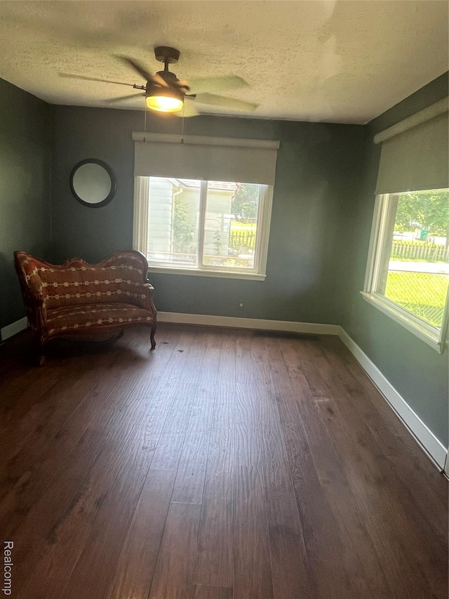 808 Lamay Ave, Ypsilanti, MI 48198 - living area with ceiling fan, dark wood-type flooring, healthy amount of natural light, and a textured ceiling