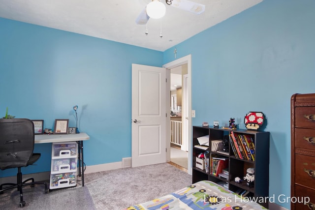1003 Kusterer Dr NW, Grand Rapids, MI 49534 - carpeted bedroom featuring a desk and a ceiling fan