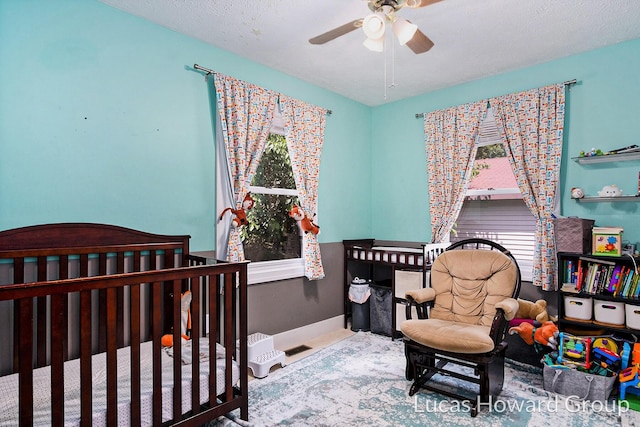 1003 Kusterer Dr NW, Grand Rapids, MI 49534 - bedroom with multiple windows and a ceiling fan
