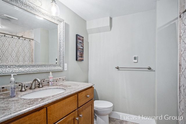 1003 Kusterer Dr NW, Grand Rapids, MI 49534 - bathroom featuring vanity, tile patterned floors, and a shower with curtain