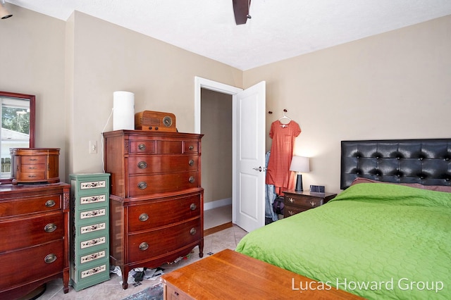 1003 Kusterer Dr NW, Grand Rapids, MI 49534 - bedroom with ceiling fan and baseboards