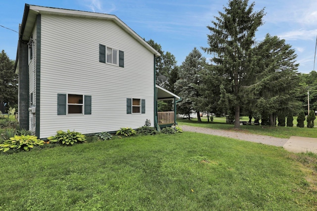 721 Foote St, Charlotte, MI 48813 - view of home's exterior featuring a yard and driveway