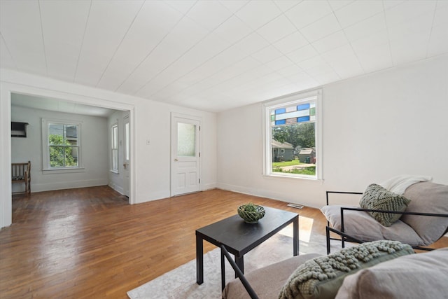 334 N Hickory St, Owosso, MI 48867 - living area with wood finished floors and baseboards