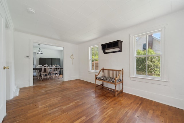 334 N Hickory St, Owosso, MI 48867 - sitting room featuring wood-type flooring and baseboards