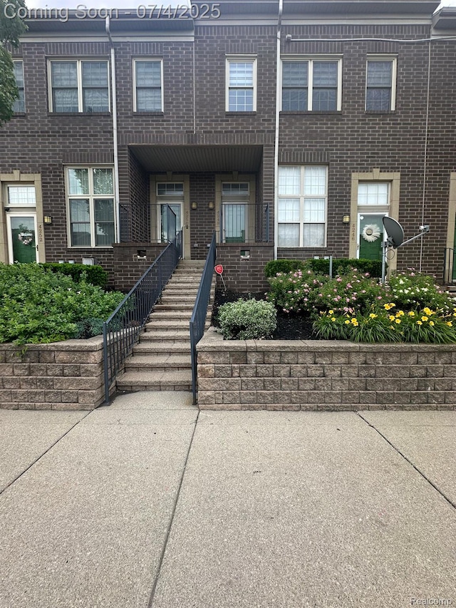 4248 Schaefer Rd, Dearborn, MI 48126 - view of front facade with brick siding and stairs