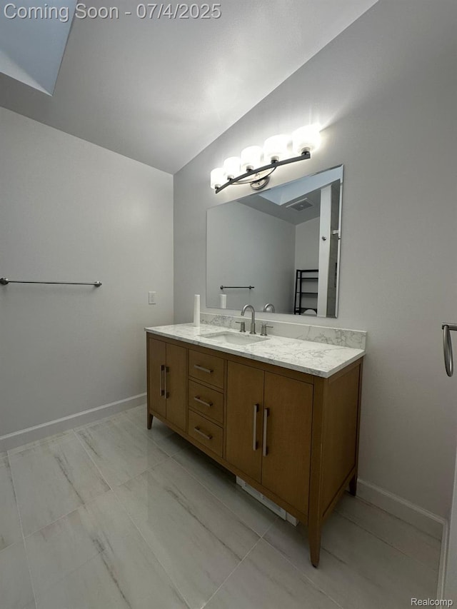 4248 Schaefer Rd, Dearborn, MI 48126 - bathroom featuring vanity and baseboards