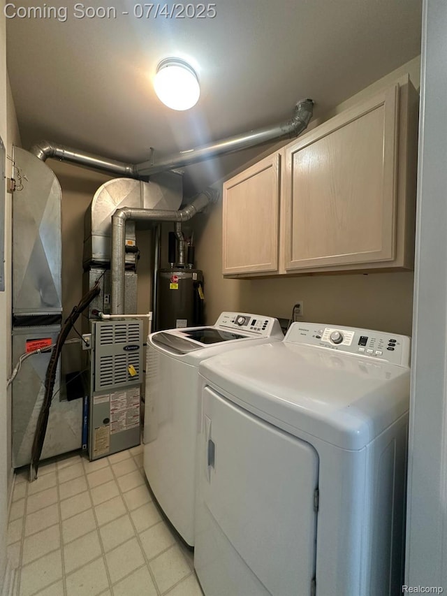 4248 Schaefer Rd, Dearborn, MI 48126 - laundry area with cabinet space, separate washer and dryer, gas water heater, and light floors