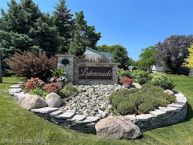 39728 Village Wood Cir, Novi, MI 48375 - community / neighborhood sign featuring a lawn