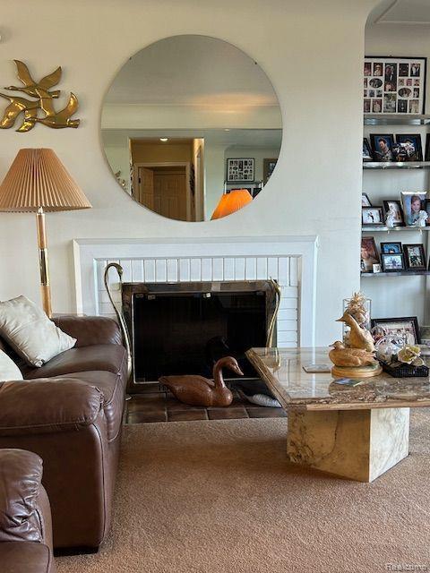 32241 N River Rd, Harrison Township, MI 48045 - detailed view of a brick fireplace and carpet flooring