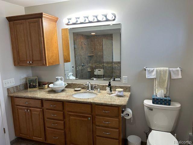 32241 N River Rd, Harrison Township, MI 48045 - full bath featuring vanity and a tile shower