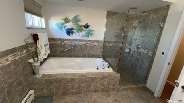 32241 N River Rd, Harrison Township, MI 48045 - bathroom featuring a jetted tub, a stall shower, tile patterned floors, and baseboard heating