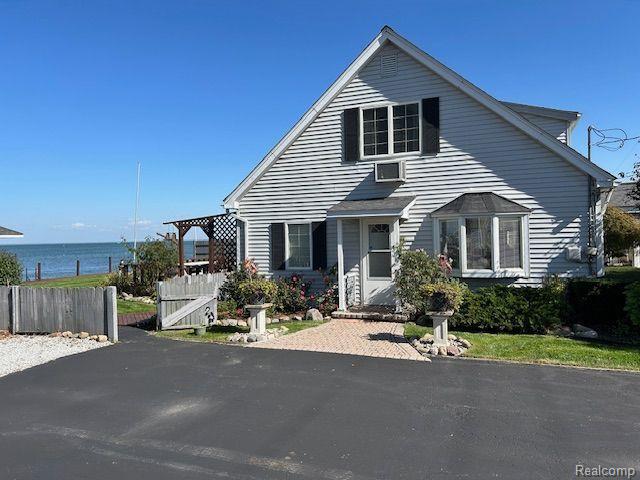 32241 N River Rd, Harrison Township, MI 48045 - view of front facade with a water view
