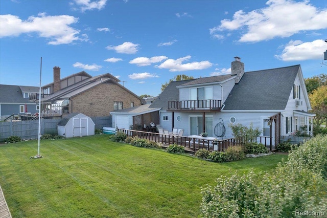 32241 N River Rd, Harrison Township, MI 48045 - rear view of property featuring a balcony, a shed, a chimney, a garage, and a deck
