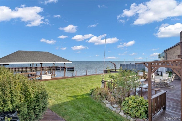 32241 N River Rd, Harrison Township, MI 48045 - view of green lawn with a water view and a boat dock