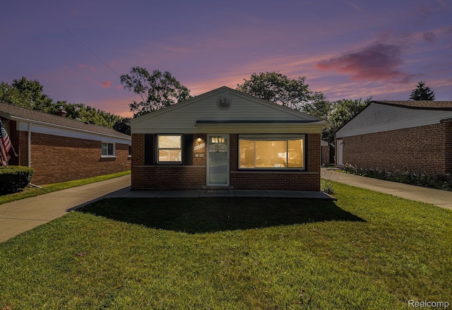 8476 Robindale Ave, Dearborn Heights, MI 48127 - single story home with brick siding and a lawn