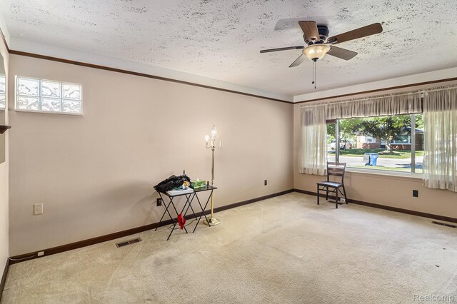 8476 Robindale Ave, Dearborn Heights, MI 48127 - carpeted empty room featuring ceiling fan and a textured ceiling