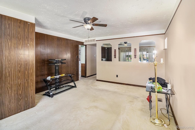 8476 Robindale Ave, Dearborn Heights, MI 48127 - unfurnished living room featuring a ceiling fan, carpet flooring, a textured ceiling, and wooden walls