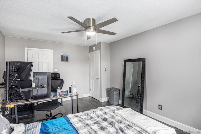 8150 24 Mile Rd, Shelby Twp, MI 48316 - bedroom featuring a desk, dark wood-style floors, a ceiling fan, and a textured ceiling