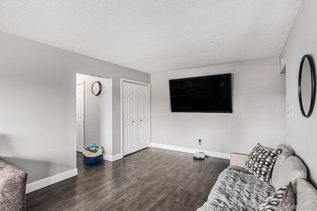 8150 24 Mile Rd, Shelby Twp, MI 48316 - sitting room featuring dark wood-style flooring and a textured ceiling