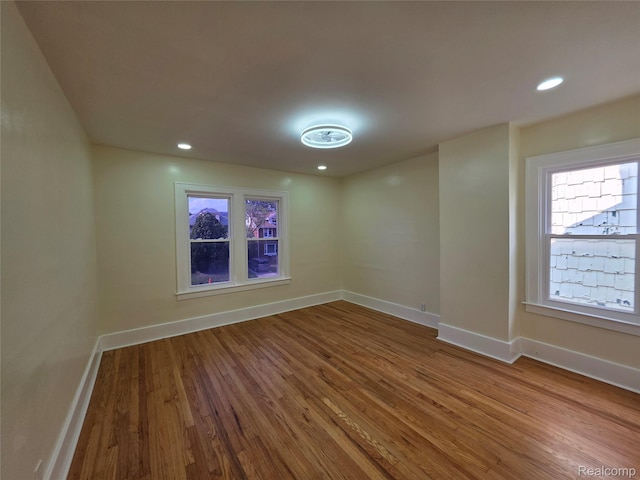 2681 Burlingame St, Detroit, MI 48206 - empty room with wood finished floors and recessed lighting