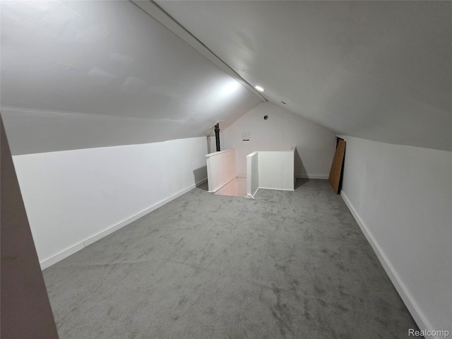 2681 Burlingame St, Detroit, MI 48206 - additional living space featuring vaulted ceiling and carpet