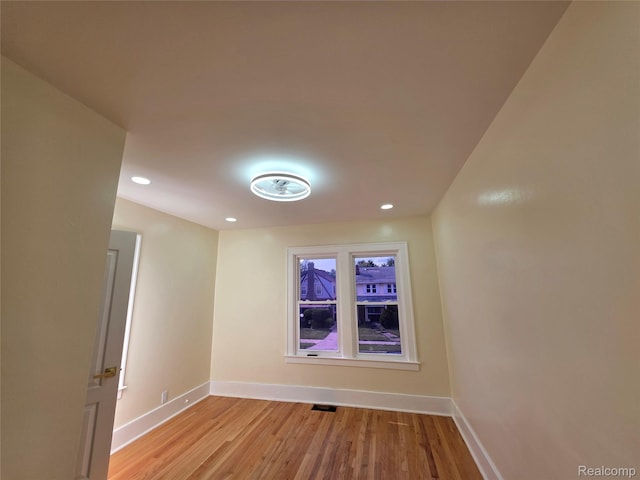 2681 Burlingame St, Detroit, MI 48206 - empty room with light wood-style flooring and recessed lighting