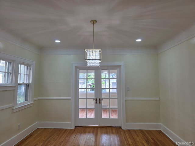 2681 Burlingame St, Detroit, MI 48206 - entryway with wood finished floors, a chandelier, and french doors