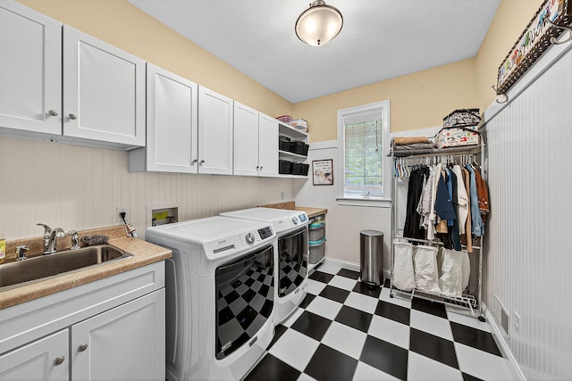 29750 Edwards Way, Niles, MI 49120 - washroom with washing machine and clothes dryer, dark flooring, and cabinet space