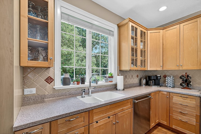 29750 Edwards Way, Niles, MI 49120 - kitchen featuring dishwasher, decorative backsplash, glass insert cabinets, and light stone counters