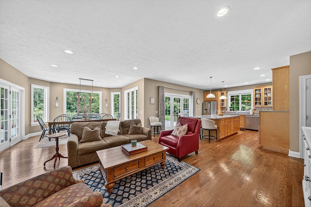 29750 Edwards Way, Niles, MI 49120 - living room with a textured ceiling, light wood finished floors, and recessed lighting