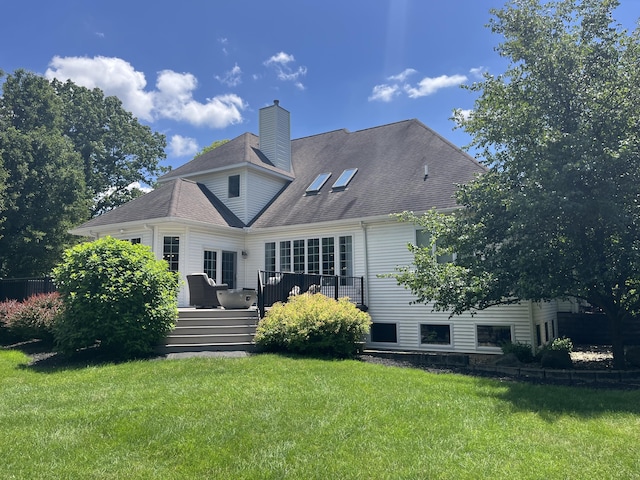 29750 Edwards Way, Niles, MI 49120 - rear view of property featuring a lawn, a deck, a chimney, and a shingled roof