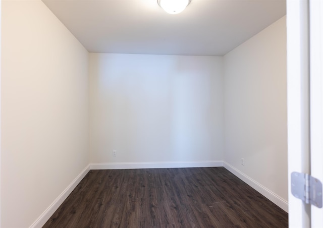 457 N Garfield, Traverse City, MI 49696 - spare room with dark wood-type flooring