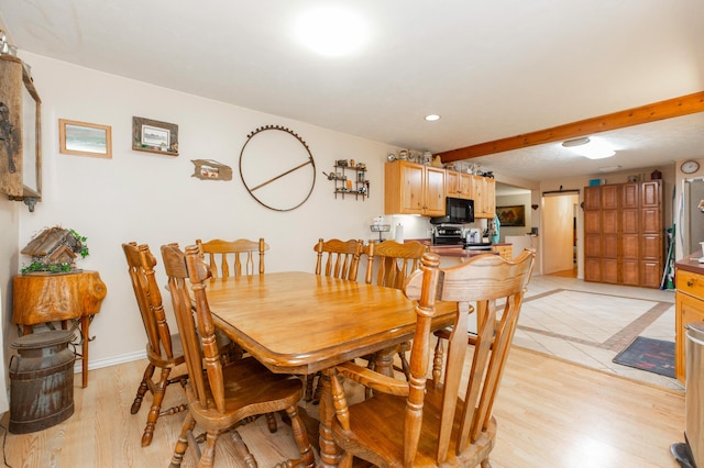 2314 Hand Rd, Niles, MI 49120 - dining space featuring light wood-type flooring, beamed ceiling, and recessed lighting