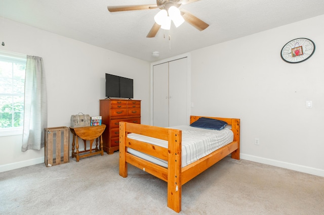 2314 Hand Rd, Niles, MI 49120 - carpeted bedroom with a closet and a ceiling fan