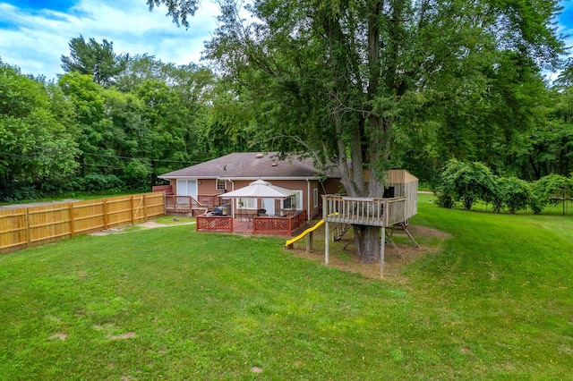 2314 Hand Rd, Niles, MI 49120 - back of house featuring a wooden deck, a gazebo, and a view of trees