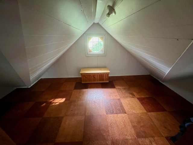 7220 W 64th St, Fremont, MI 49412 - additional living space featuring tile patterned floors and lofted ceiling