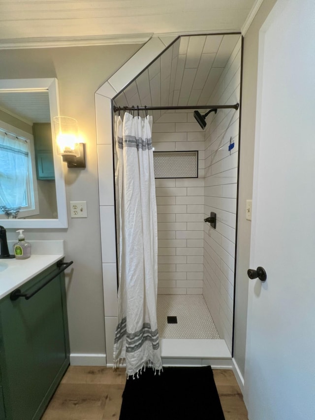7220 W 64th St, Fremont, MI 49412 - bathroom featuring wood finished floors, vanity, and a shower stall