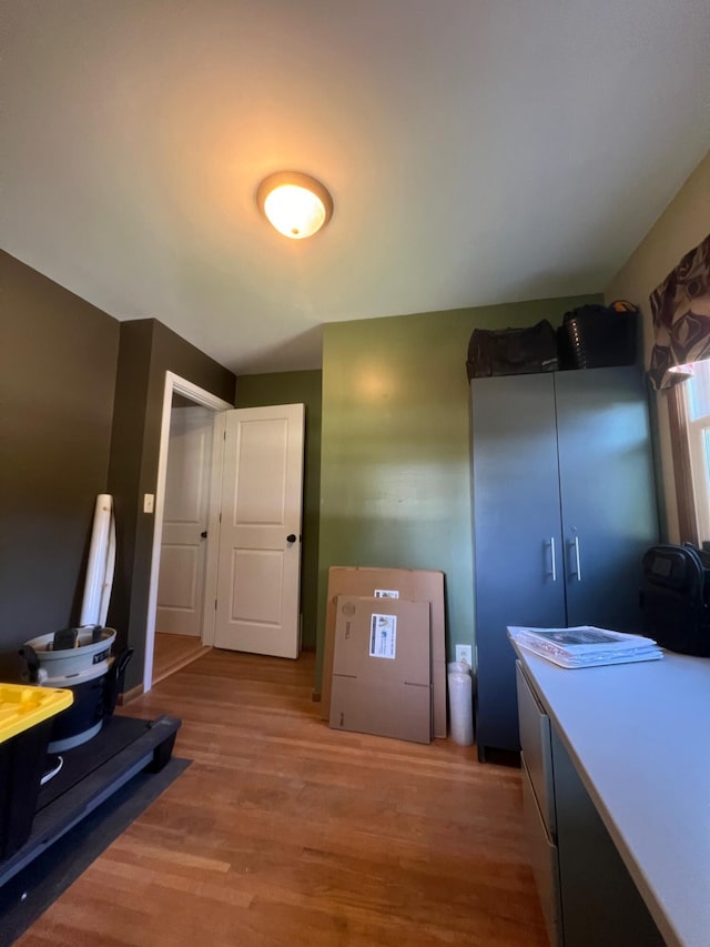 7220 W 64th St, Fremont, MI 49412 - interior space featuring light wood finished floors and a desk