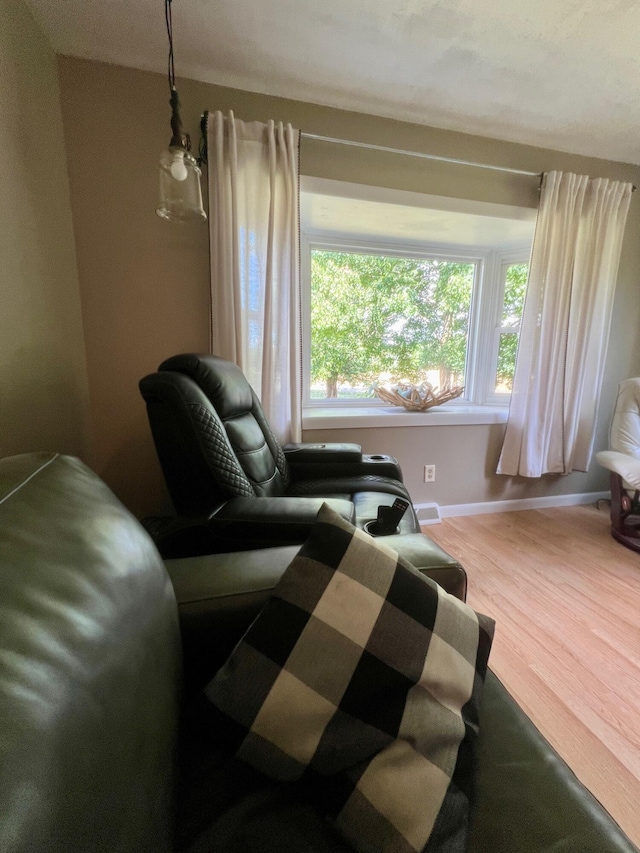 7220 W 64th St, Fremont, MI 49412 - living area featuring wood finished floors and baseboards