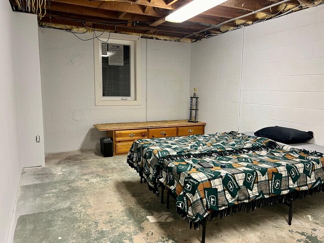 7220 W 64th St, Fremont, MI 49412 - bedroom with unfinished concrete flooring