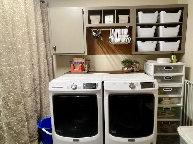 7220 W 64th St, Fremont, MI 49412 - washroom featuring cabinet space and separate washer and dryer