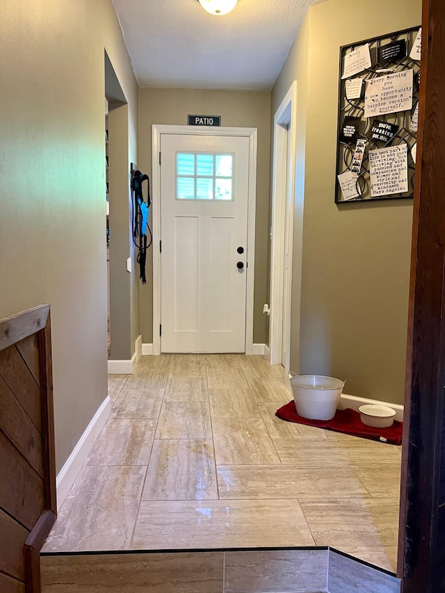 7220 W 64th St, Fremont, MI 49412 - foyer entrance featuring baseboards