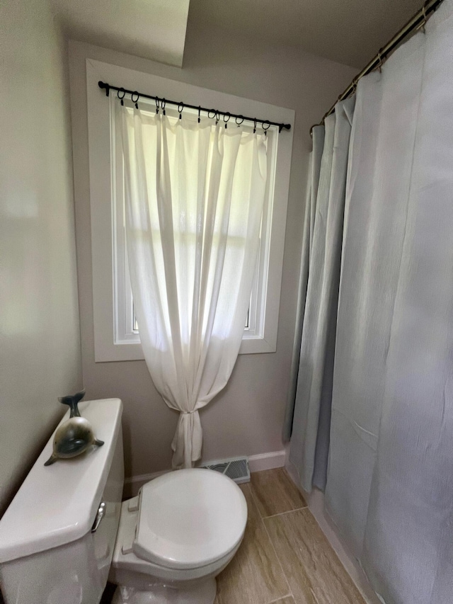 7220 W 64th St, Fremont, MI 49412 - bathroom featuring toilet and a shower with curtain